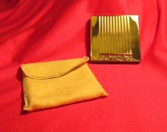 Vintage RETRO gold tone AVON COMPACT unused in original carrying bag