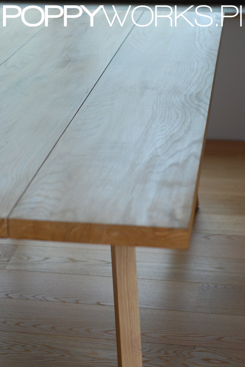 Handmade solid wood dining table. Contemporary design