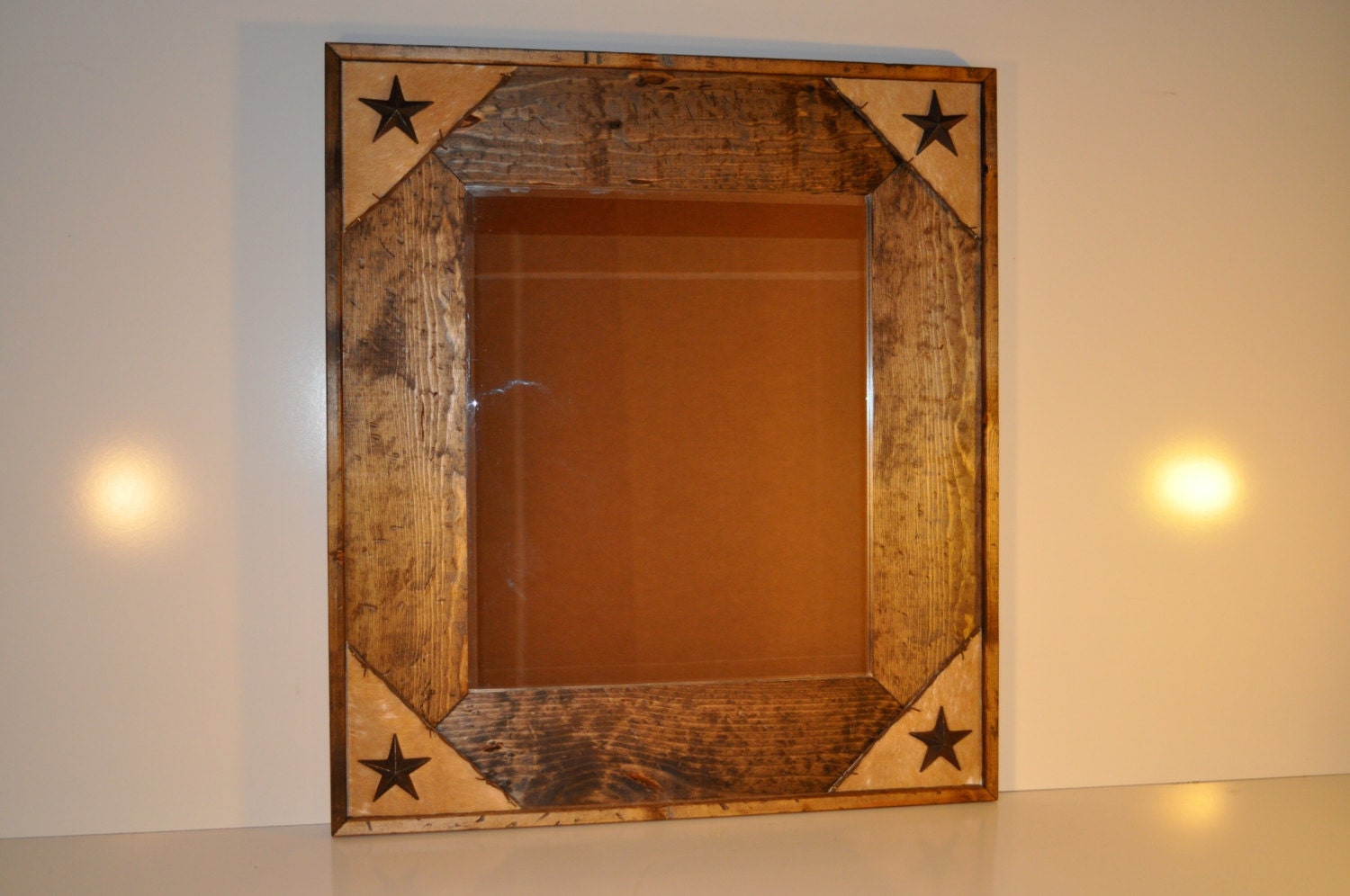 Medium Rustic Western Mirror framed with wood cowhide barb