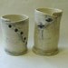Two Industrial Tumblers