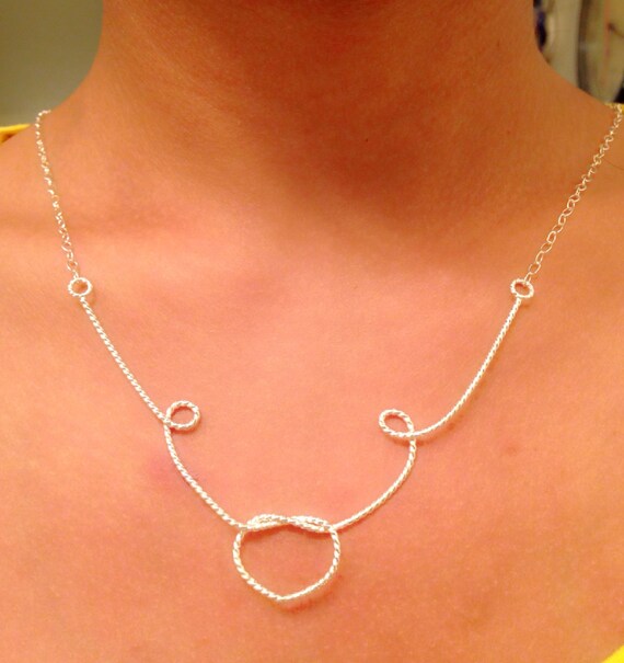 Items similar to Sterling Silver Love knot necklace, V shape necklace, Love Knot Necklace on Etsy
