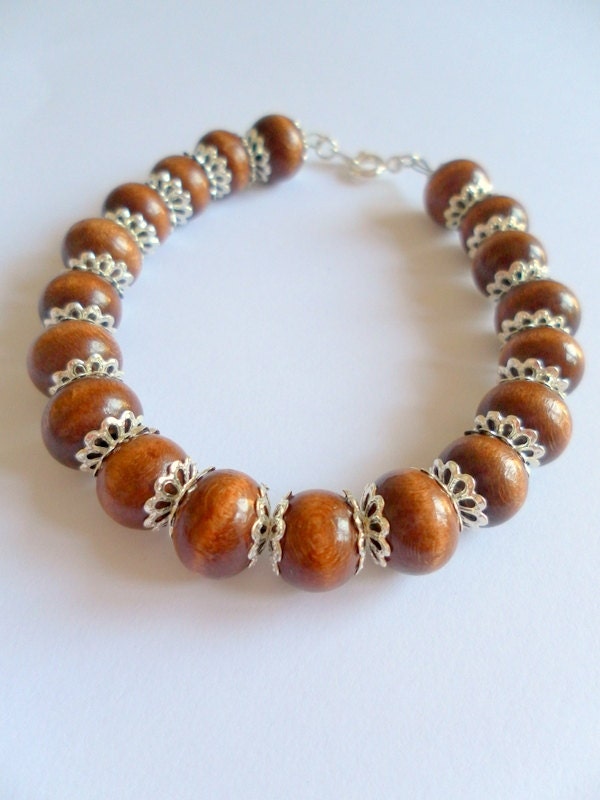 Wooden Beaded Bracelet by StarryJewelsUKChanel on Etsy