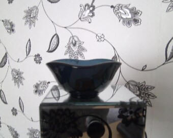 Teal blue glass candle holder