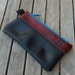 Eco friendly zipper pouch made from reclaimed bicycle inner tubes.