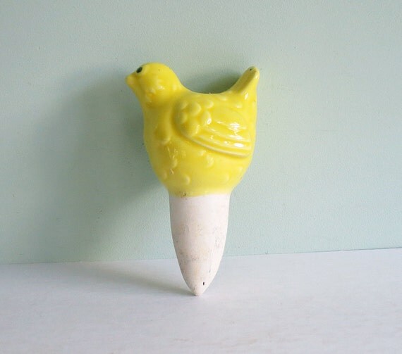 Ceramic Yellow Bird Spike for Watering a Plant