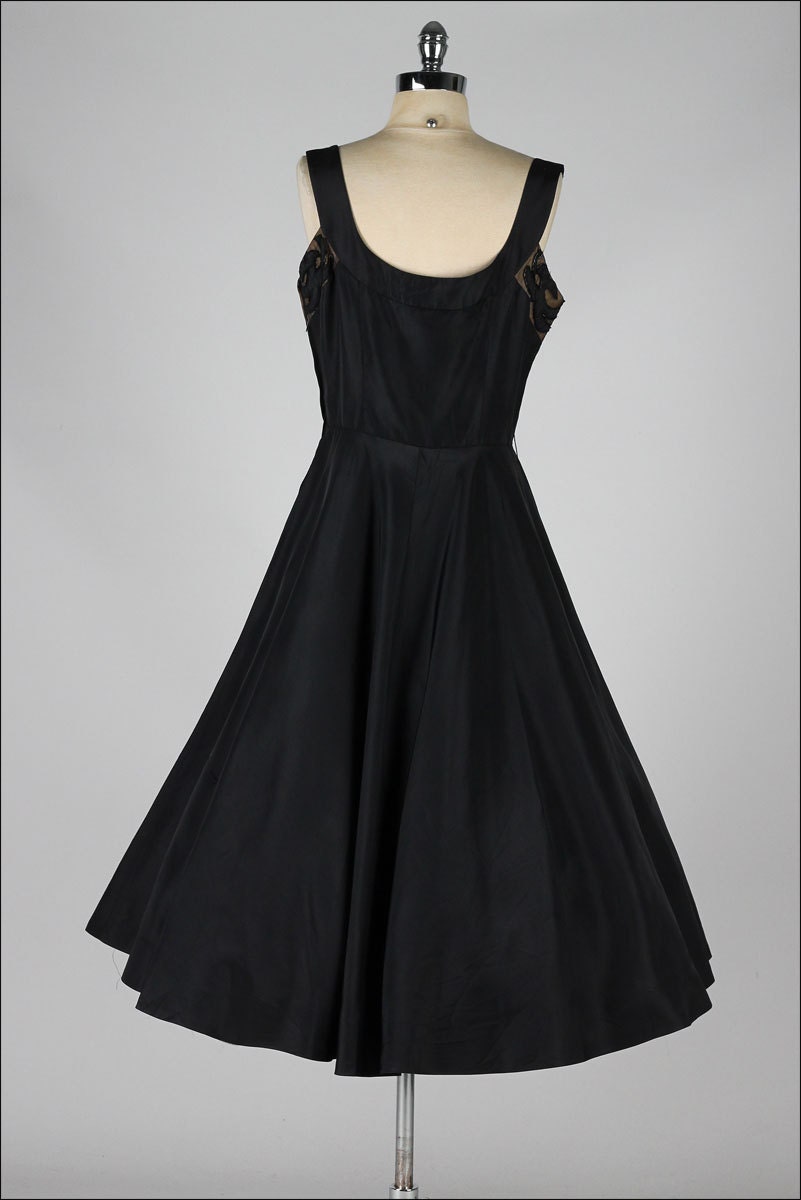 vintage 1950s dress . black taffeta . beaded illusion . party