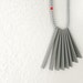 geometrical tribal necklace with grey sticks and beads - contemporary jewelry