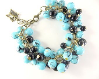 Turquoise and black cha cha bracelet (6 1/2 - 7 1/2")