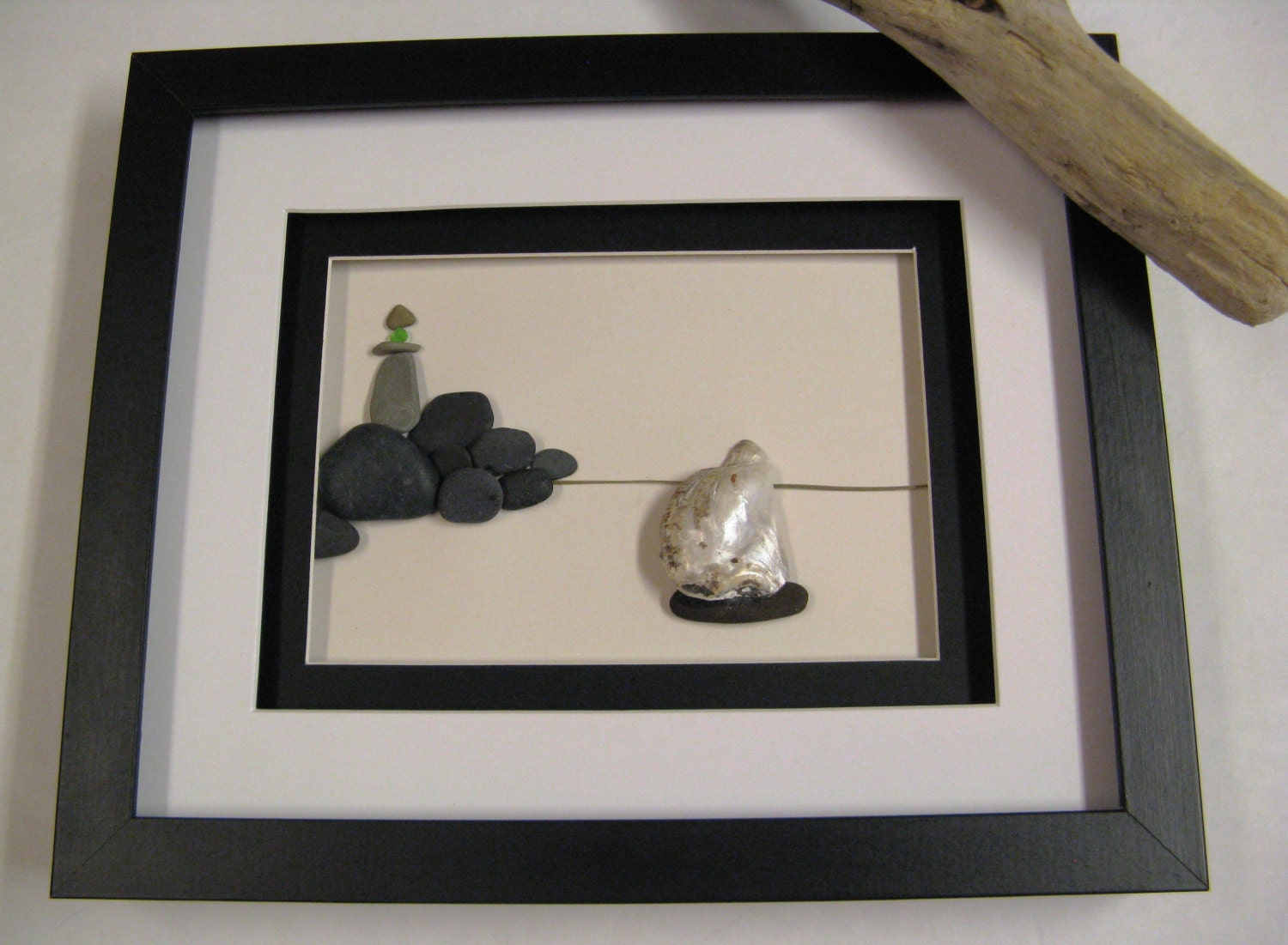 Framed beach stone lighthouse and sail boat Stone Art