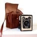 Kodak Brownie Camera / Six-20 Brownie Model C vintage film camera and camera bag. Made in England 1950s.