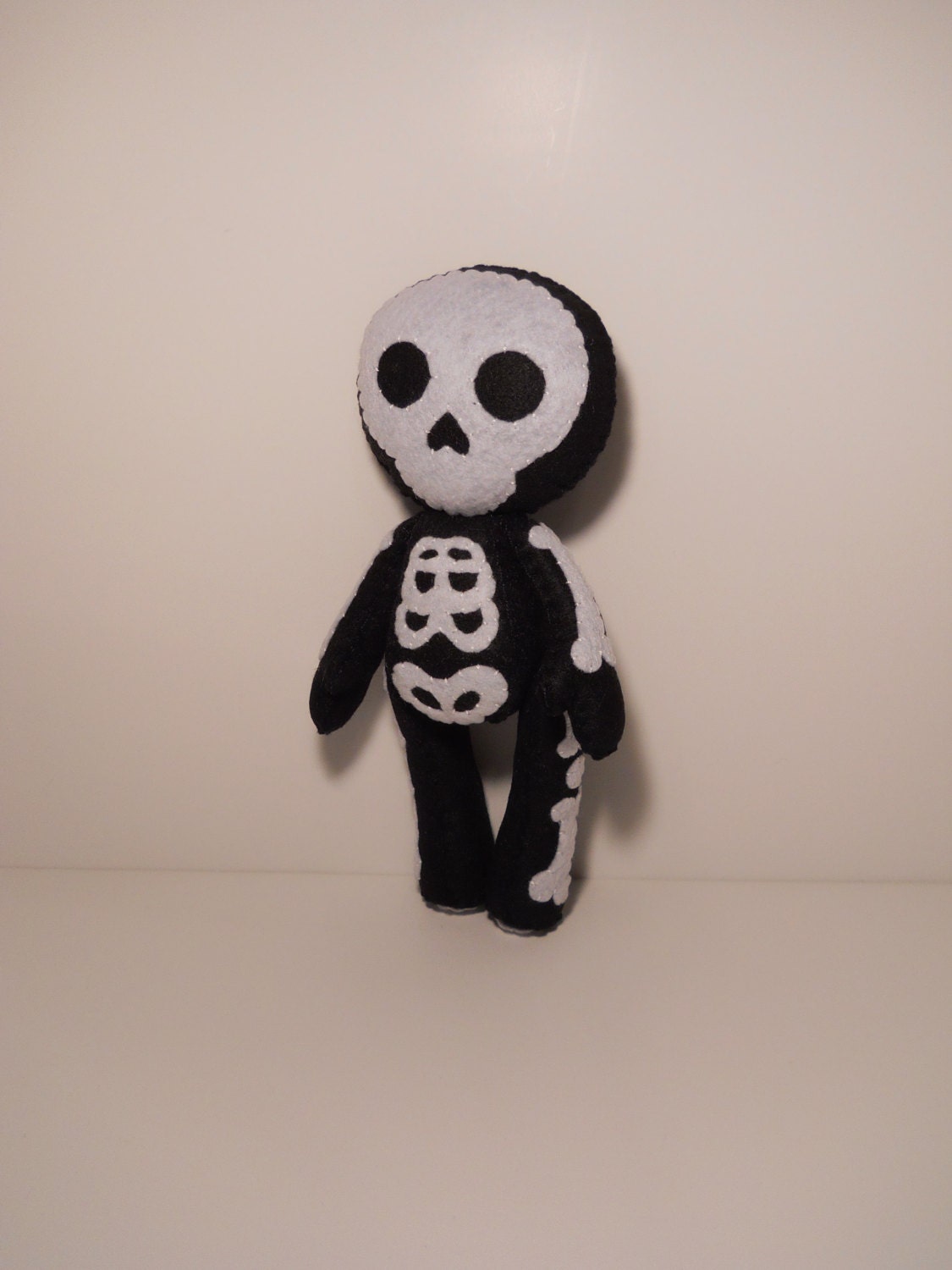 stuffed skeleton doll