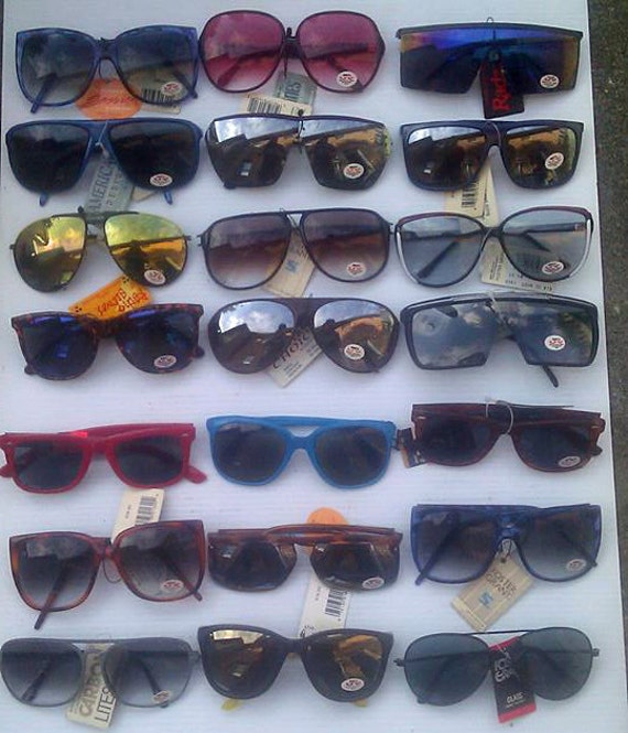 21 Vintage name brand sunglasses 70s and 80s era all in new
