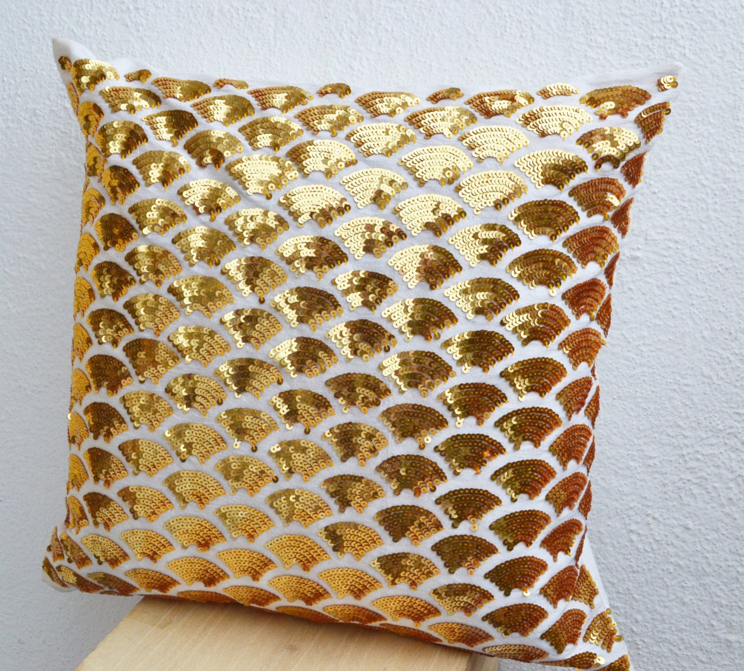 Gold sequin pillows with embroidered waves Gold covers