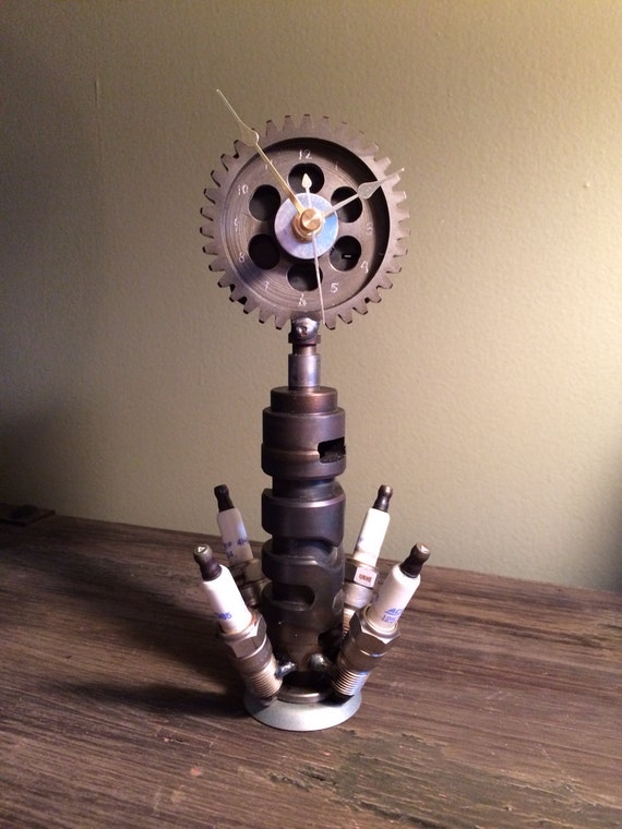 Hand crafted desk clock using repurposed engine/car parts.