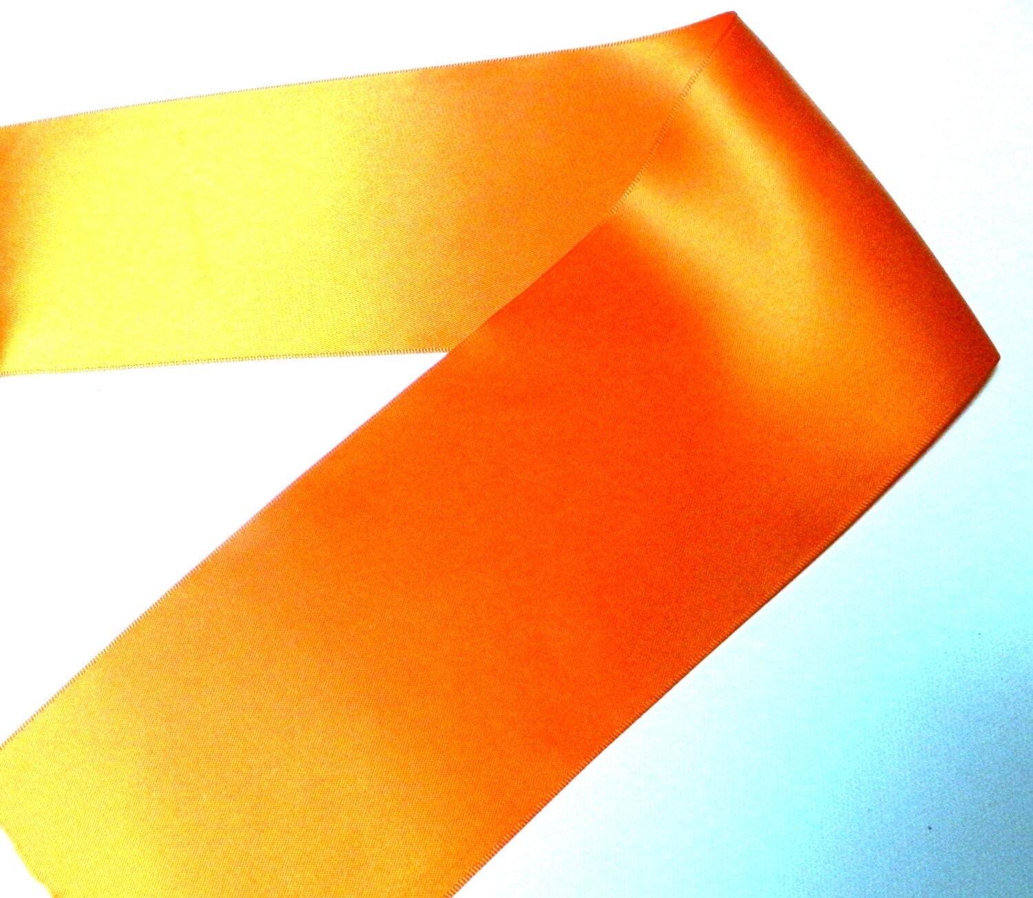 4 inch wide orange double sided satin ribbon 100 polyester 4 inch wide orange double sided satin ribbon 100 polyester