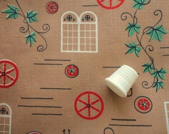 red and green on tan novelty print vintage cotton fabric -- 35 wide by 1 1/3 yards