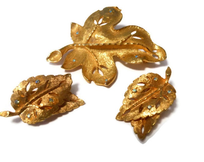 Leaf brooch and earrings, Gold tone leaf design statement brooch and earrings with green faceted rhinestones, quite possibly unsigned BSK