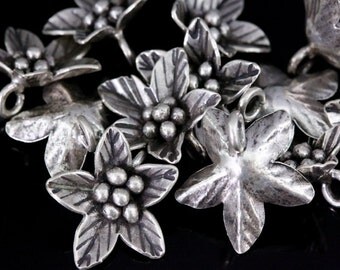 4KH-032 thai karen hill tribe silver 2 wild flower charm