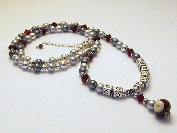 http://www.artfire.com/ext/shop/product_view/signaturesterling/2967094/sterling___crystal_ohio_state_set_necklace__bracelet__earrings/handmade/jewelry/sets/beadwork