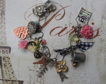 With Love from Paris.vintage jewelry assemblage charm bracelet