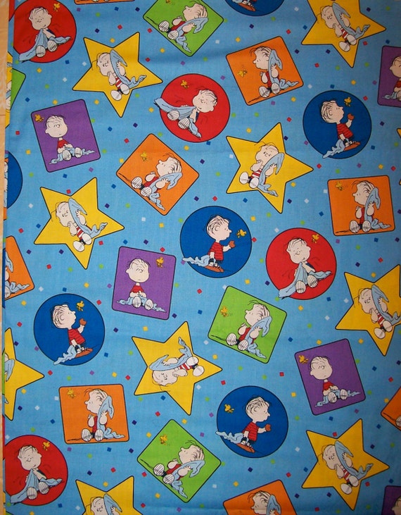 A Wonderful Quilting Treasures Peanuts Blue Tossed Linus With