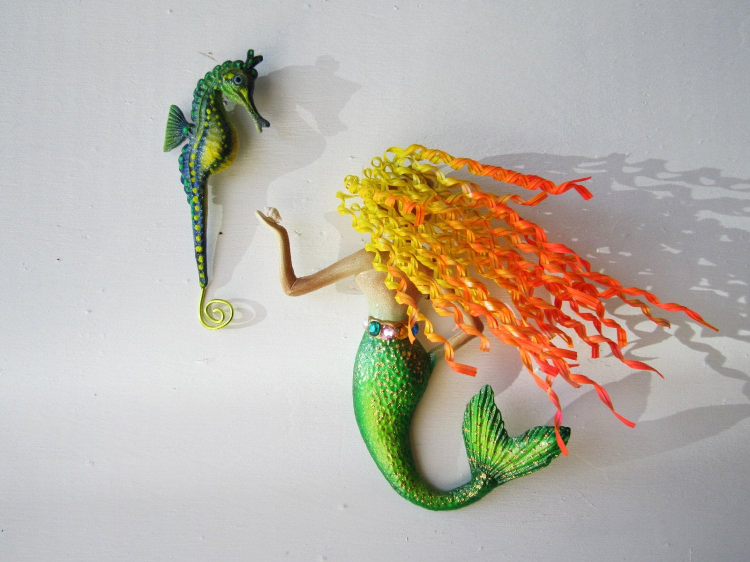 Mermaid art with seahorse wall sculpture