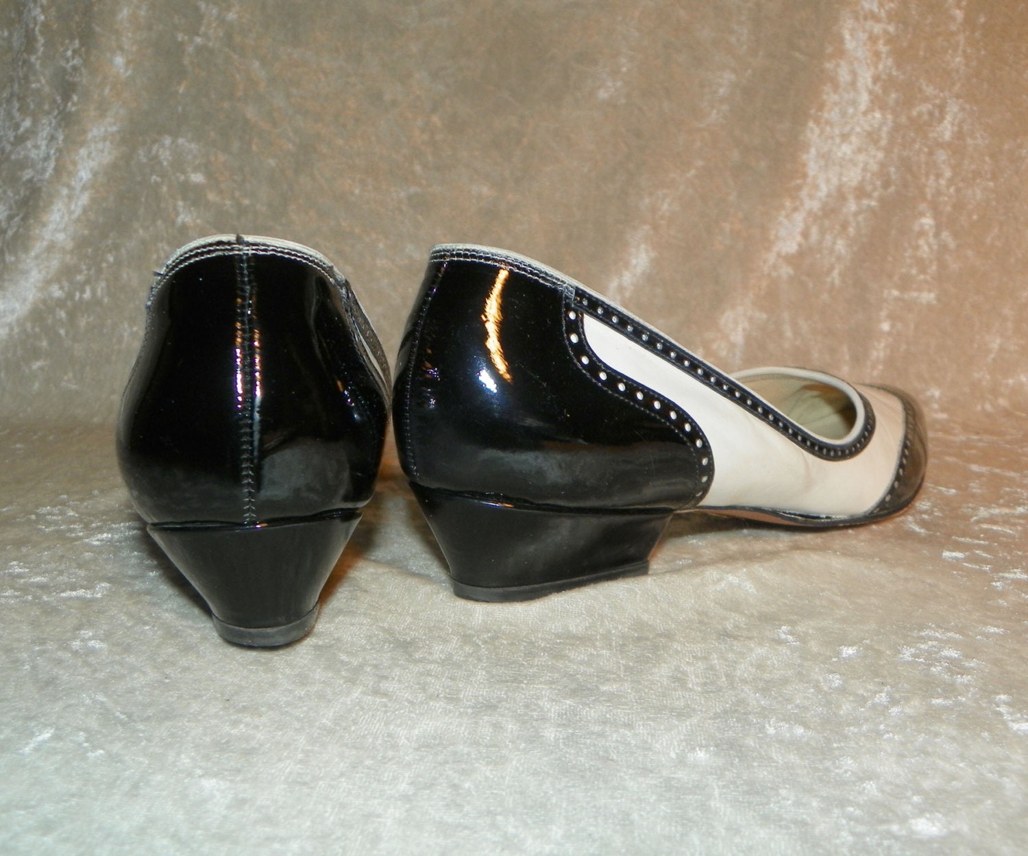 black and white spectator flats