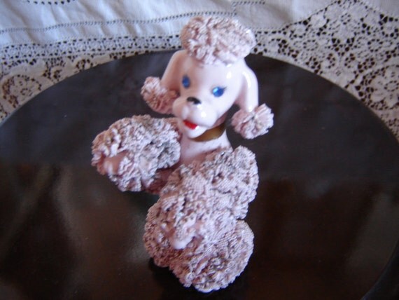 pink spaghetti poodle figurine