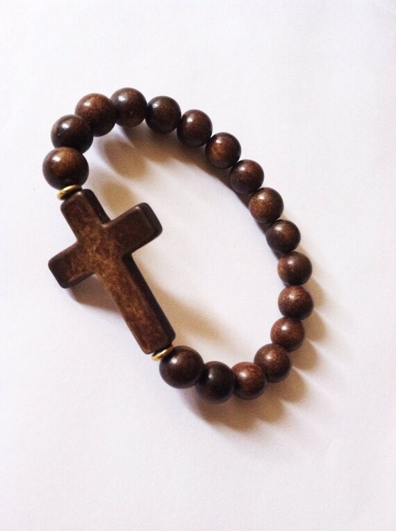 Items similar to Men's wooden cross bracelet on Etsy