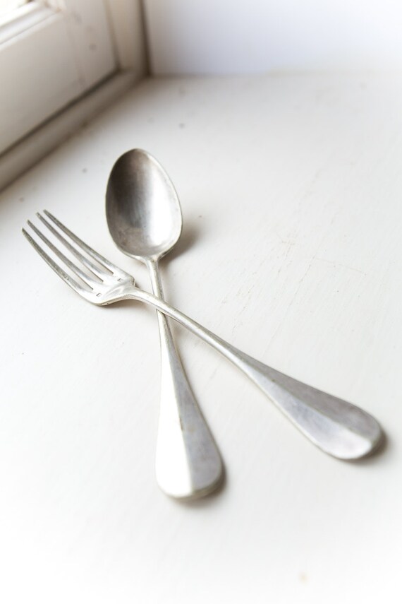 Made monogrammed. hallmarked utensils in serving kitchen  serving France monogrammed utensils