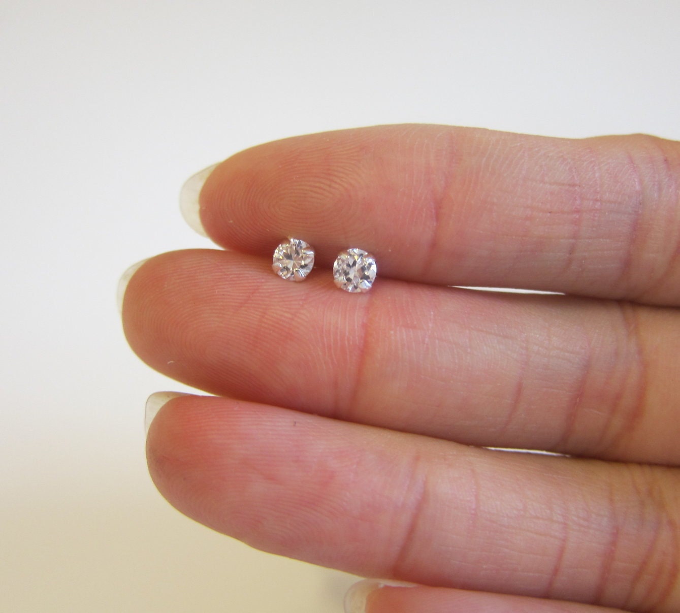 Available in 14 color 4mm Sterling silver CZ Stud Earrings