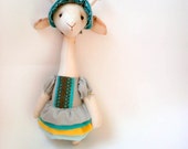 Cloth animal doll. Giraffe in a gray-turquoise dress. Fresh mint summer turquoise doll.