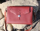 Handcrafted leather 15" MacBook Pro laptop case with adjustable belt