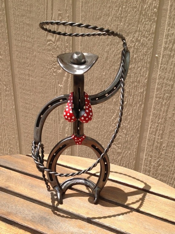 Bikini clad roping cowgirl art horseshoe sculpture hand