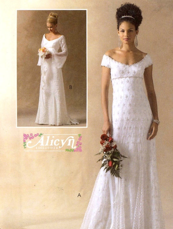 Brides Wedding  dress  Empire waist short  or bell sleeves