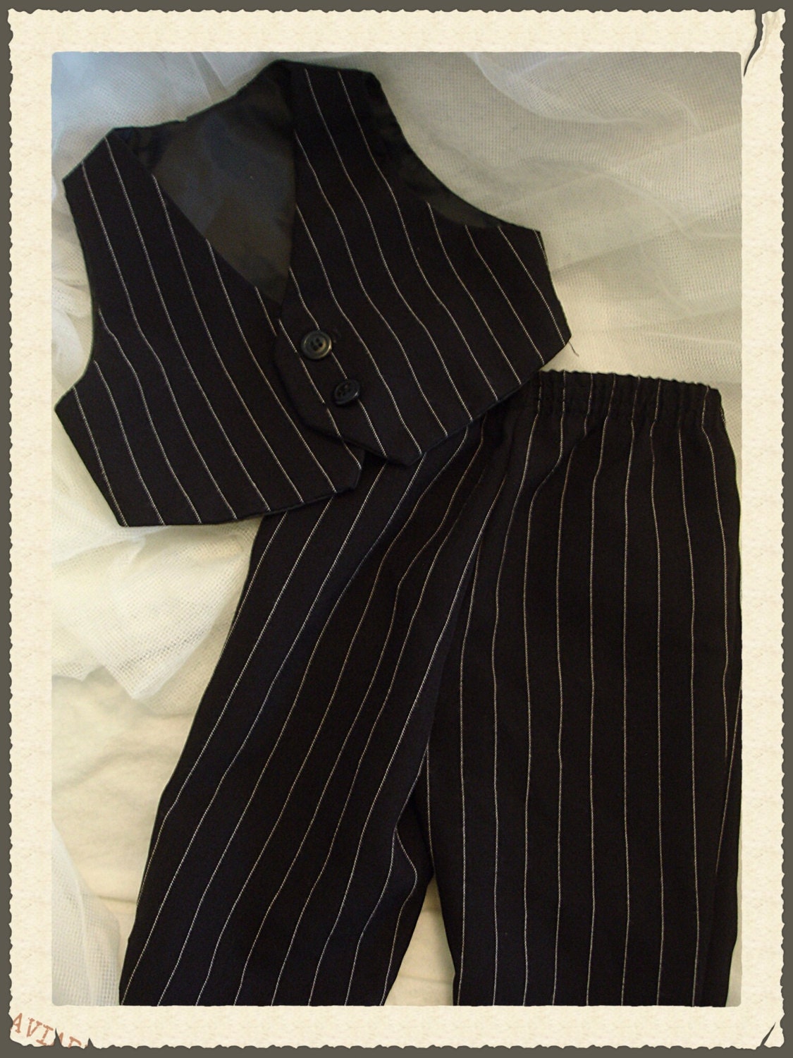 white and black pinstripe pants