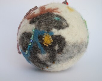 Felted ball with ornament for the Christmas tree or other decoration.