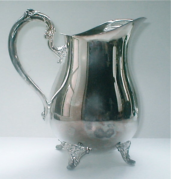 Items similar to Oneida Silver Plate Water Pitcher Classic Round Belly Footed Serving Jug
