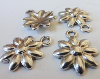 10 Flower Charms (approximately) 20x15x3mm