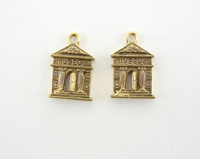 Two Gold-tone Pewter Museum Facade Charms