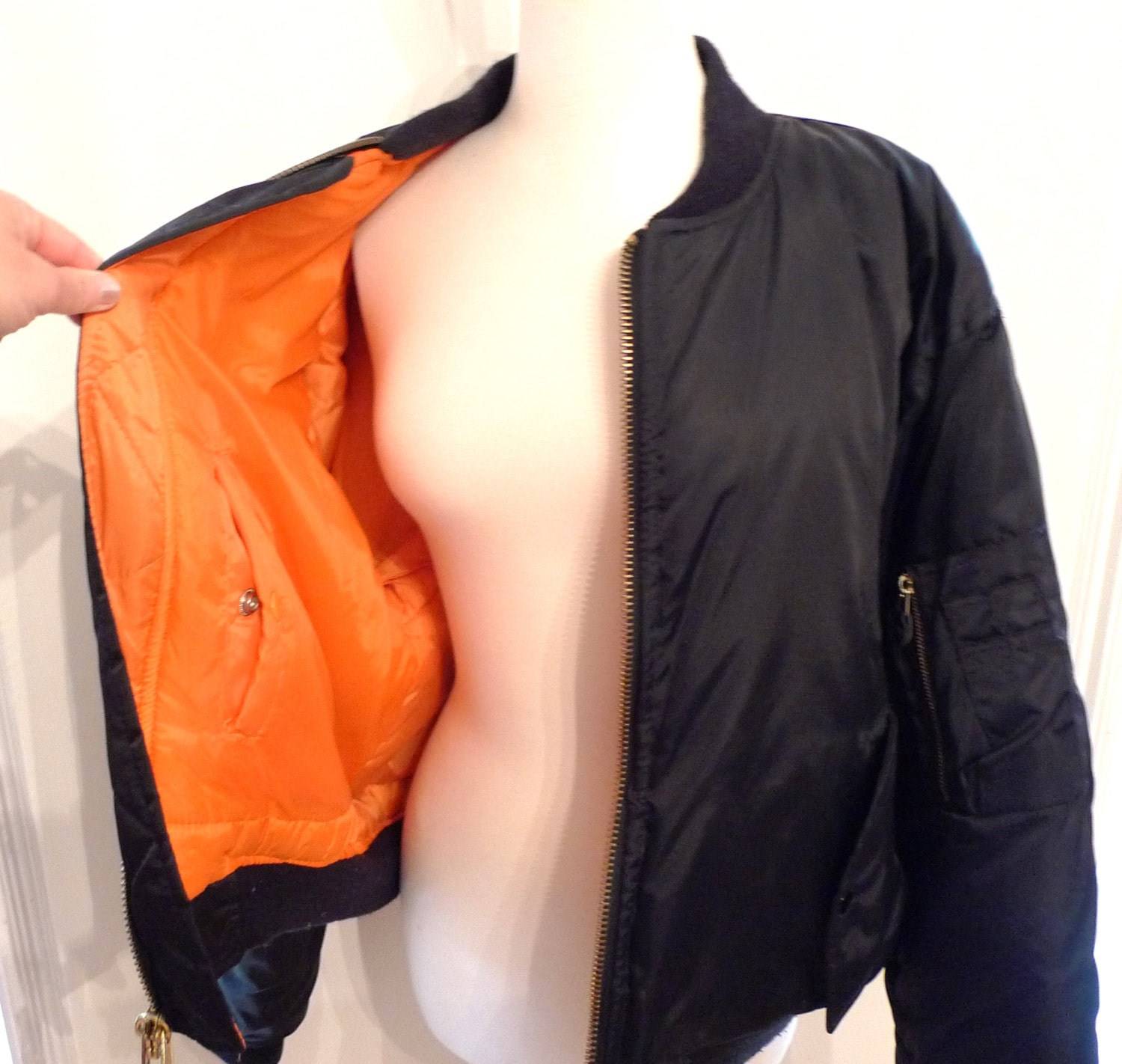 black jacket with orange lining