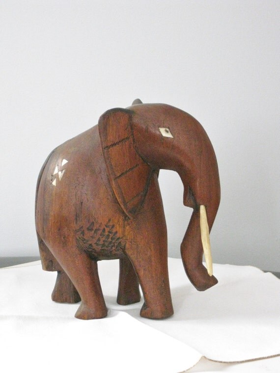 large wooden elephant sculpture