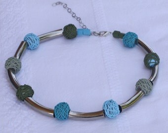 Festive necklace with silver plated tube beads and olive-aqua polymer clay beads
