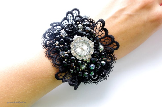 Romantic bracelet watch with lace and pearls. Wrist watch.