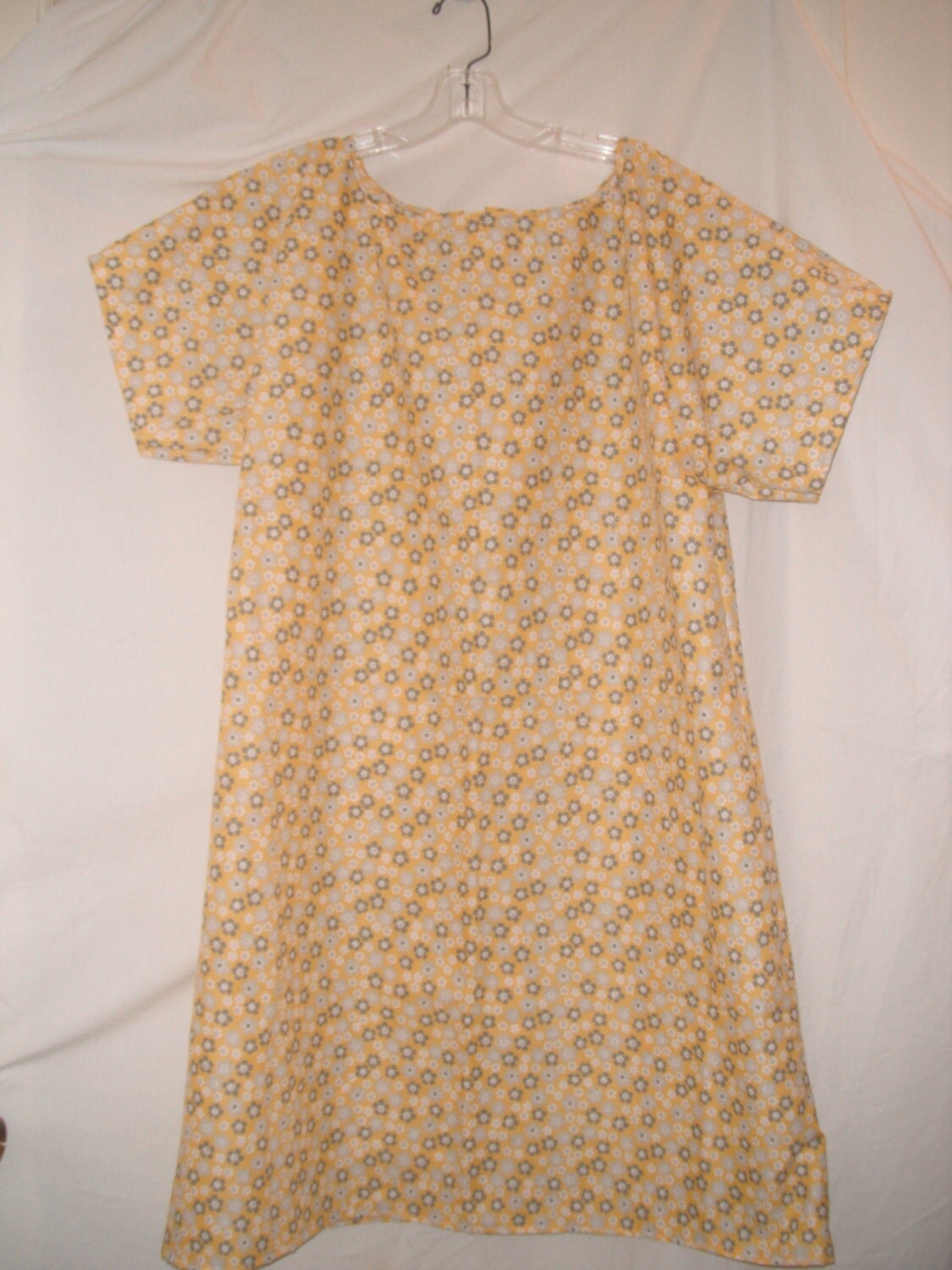 yellow hospital gown