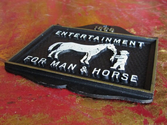 An 1888 sign advertising entertainment for man and horse. Karaoke perhaps?