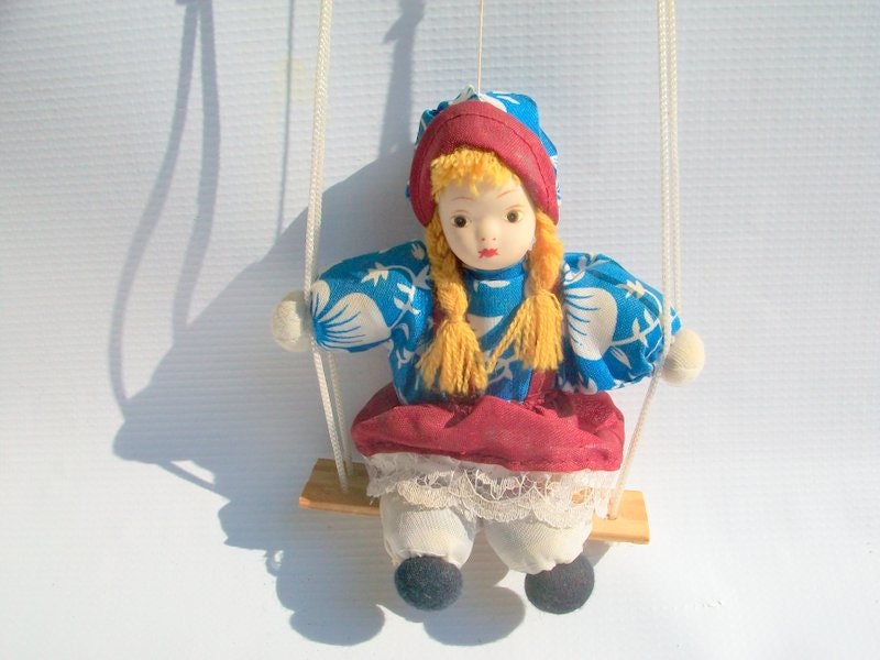 Vintage Doll Puppet On A Swing