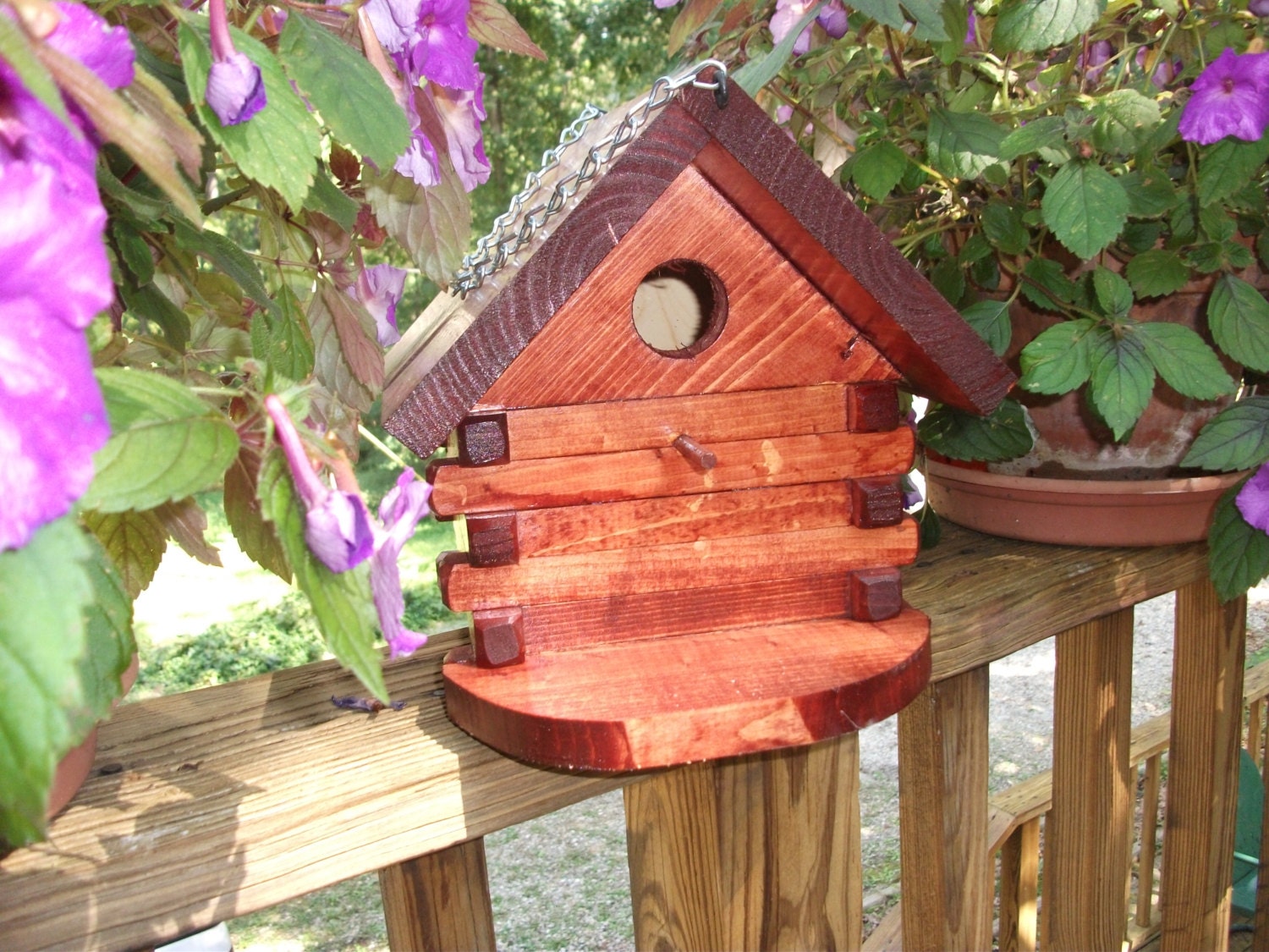 log-cabin-style-bird-house-made-for-the-birds-with-vented