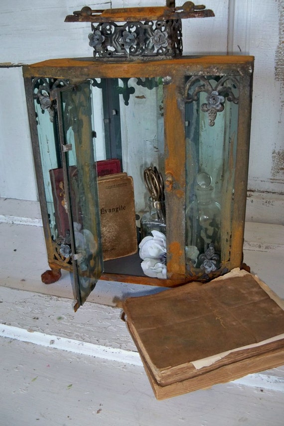Ornate display case glass metal rusted observation showcase