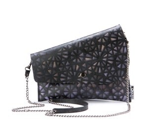 black and purple clutch bag